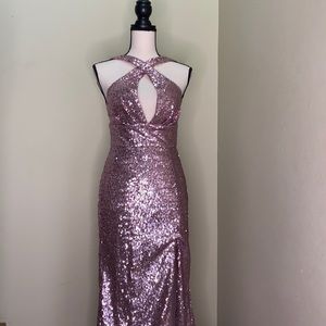 Pink sequin floor length gown.